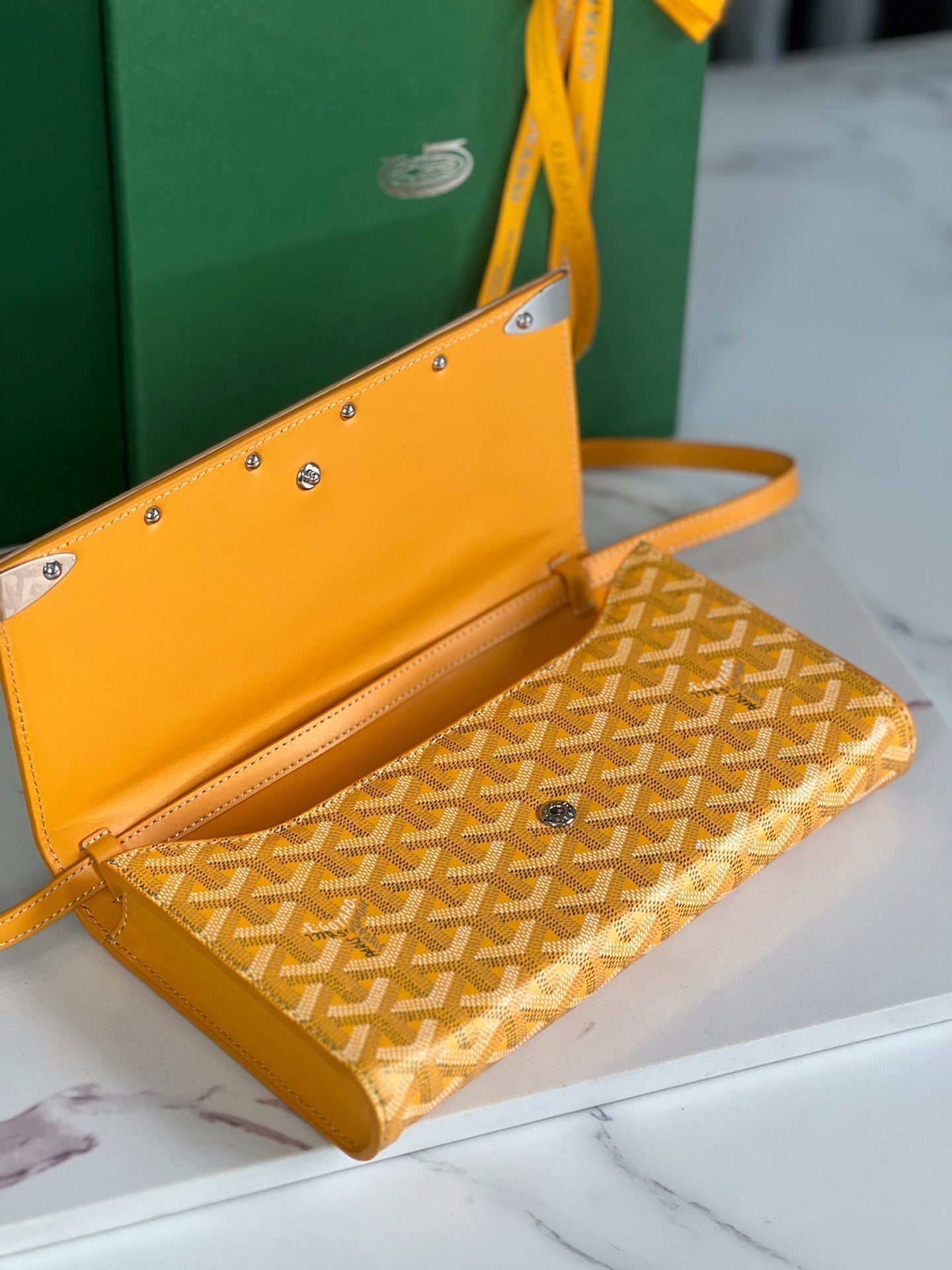 MONTE-CARLO PM CLUTCH 25 IN YELLOW GOYARDINE CANVAS