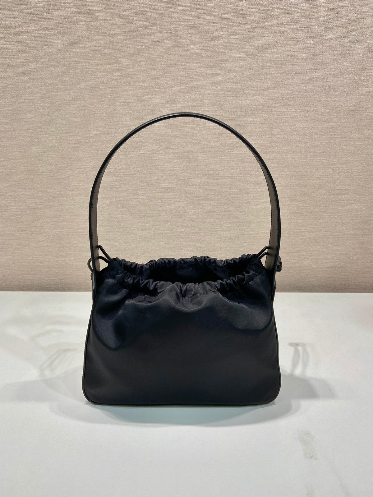 PRADA SMALL DRAWSTRING BAG 23 IN BLACK RE-NYLON