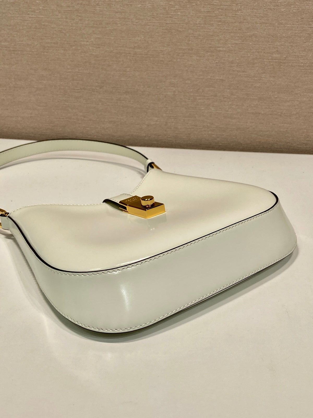 PRADA CLEO SHOULDER BAG 22 IN WHITE BRUSHED LAMBSKIN WITH CLASP CLOSURE