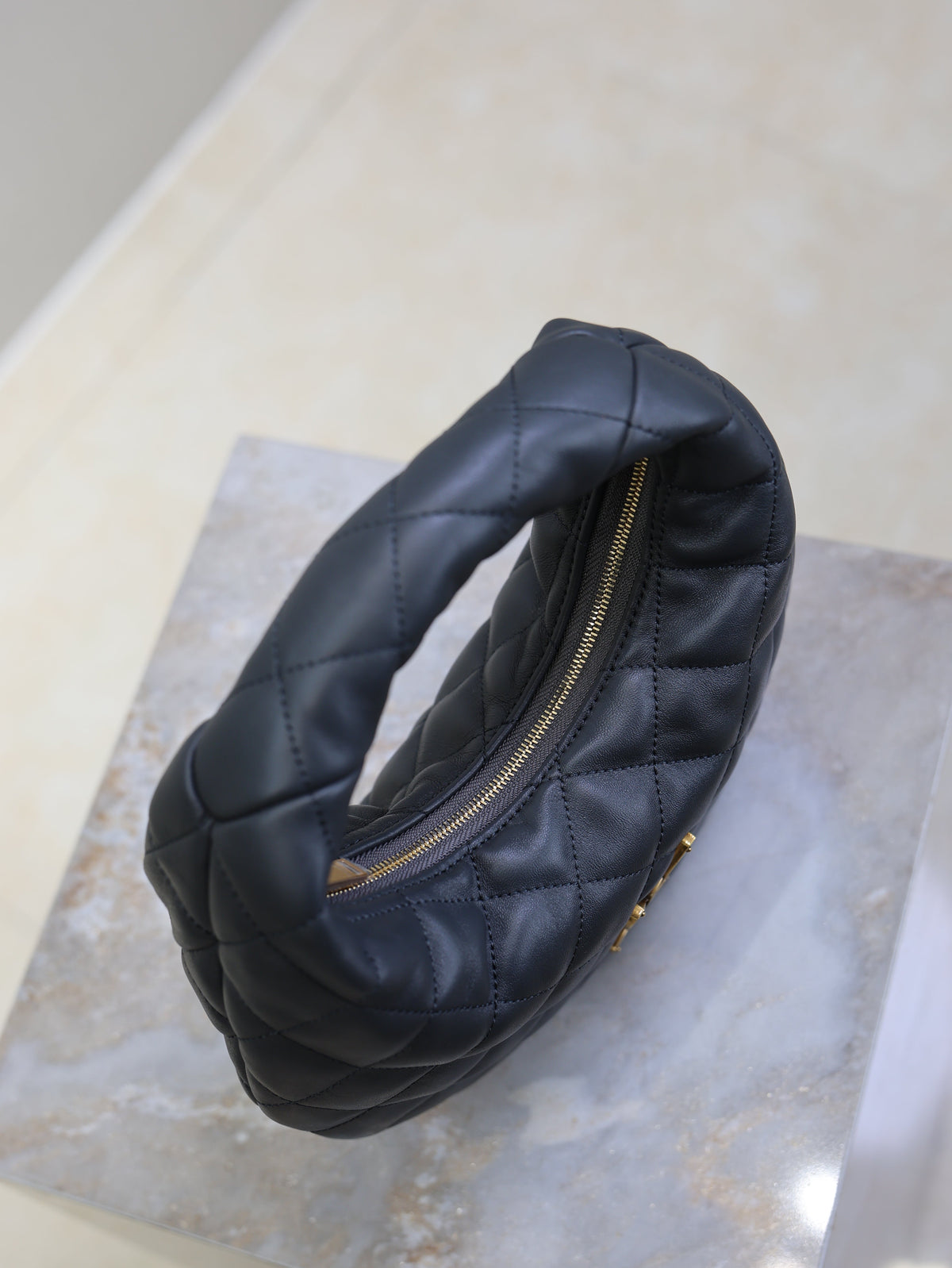 YSL 25S ICARINO 17 IN BLACK QUILTED CALFSKIN GOLD HARDWARE