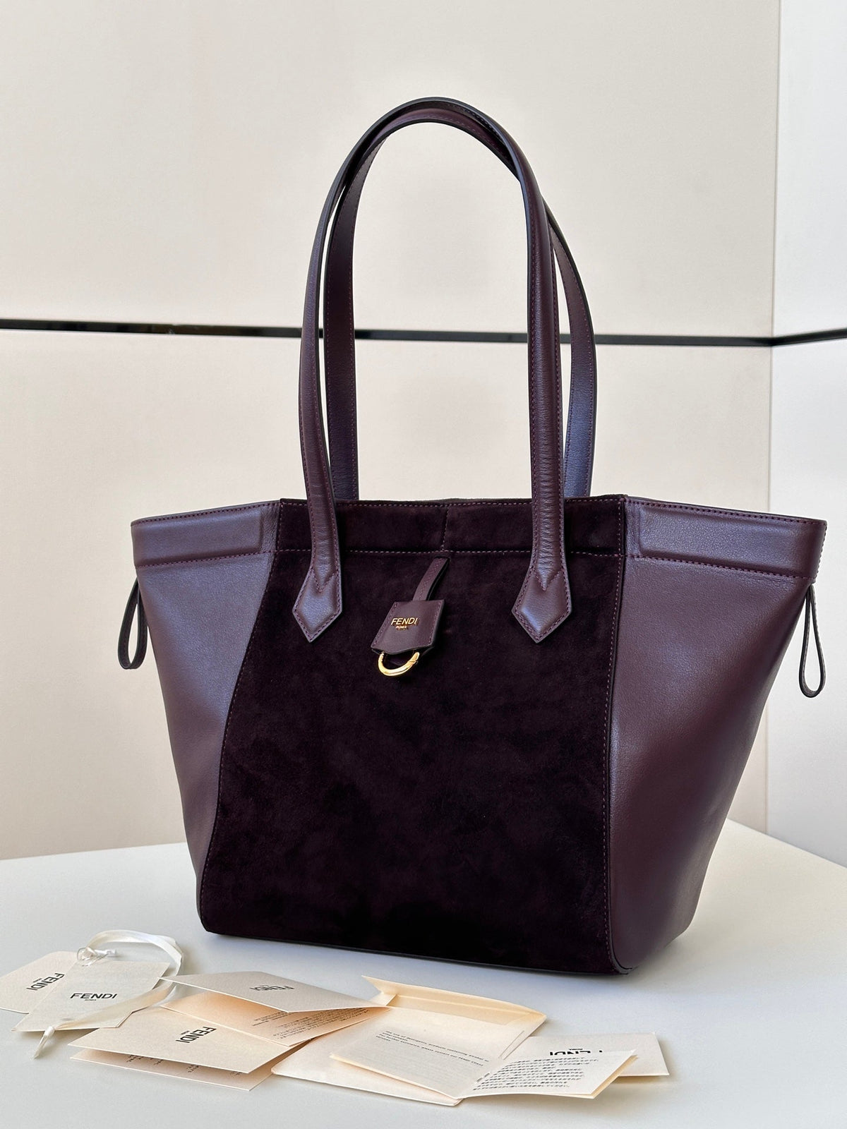ORIGAMI MEDIUM 27 IN WINE RED LAMBSKIN AND SUEDE